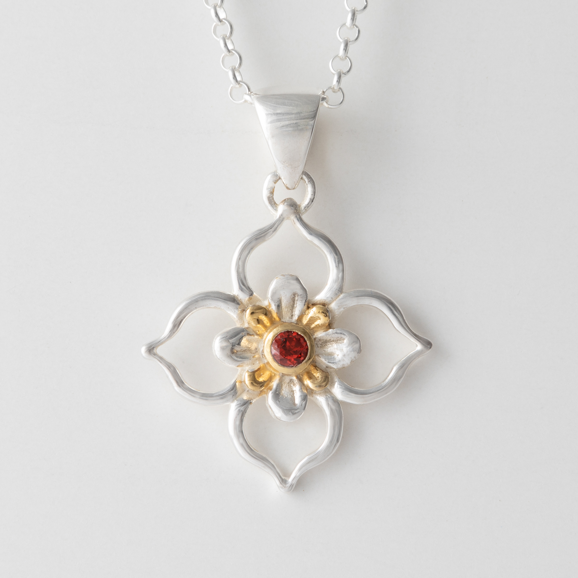 Sterling Silver Open Petal Pendant with 18k Gold Plate accent